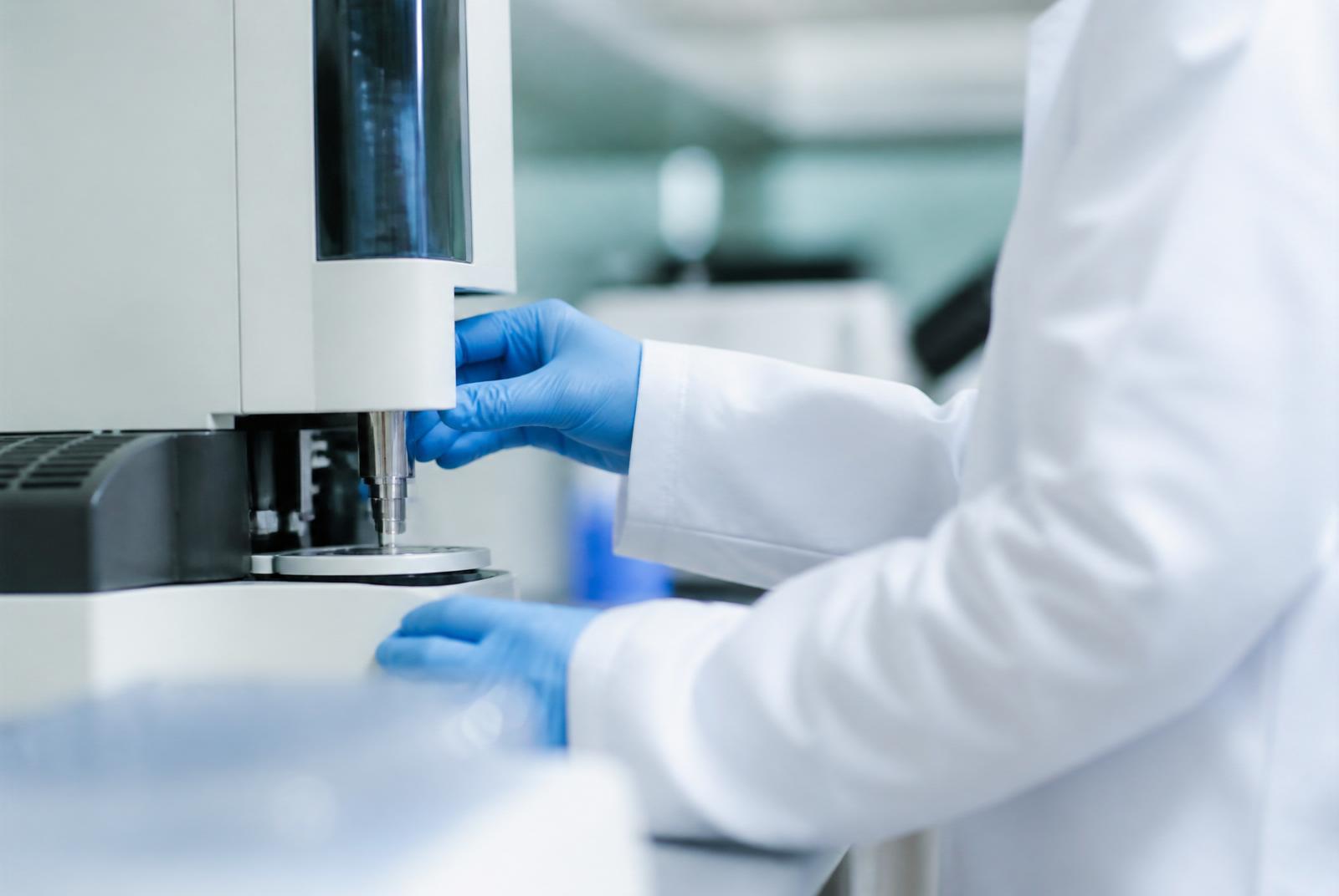 Scientists performing pharmaceutical quality testing